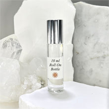 Cargar imagen en el visor de la galería, The Parfumerie offers a clear glass 10 ml Roll On Bottle with Stainless Steel roller and Silver Shiny Cap.