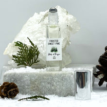 Load image into Gallery viewer, 7.5 ml Clear Glass Roller Bottle with a Stainless Steel Rollerball Insert and Silver Shiny Cap. Travel Size Perfume Bottle.