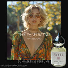 Load image into Gallery viewer, An amazing Summertime Perfume! Photo of beautiful woman with glasses wearing a dress and Amber Cream.