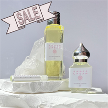 Load image into Gallery viewer, 30 ml Gift Bottle Perfume SALE. Enjoy $10.00 off of this Riddle Oil. Riddle Amber. Sale item offered by The Parfumerie.