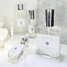 Load image into Gallery viewer, Amber White also comes in a 2 oz. Eau de Parfum blended with Certified Organic Cane Alcohol. Shiny Sprayer.