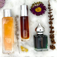 Load image into Gallery viewer, The Parfumerie offers Private Label Perfumes. Here you see a Roll On Bottle and 2 different size Gift Bottles.
