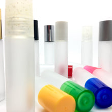 Load image into Gallery viewer, Frosted 10 ml Roller Bottles with Color Caps. Make these your Private Label Brand!