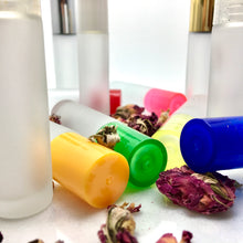 Load image into Gallery viewer, Frosted Roll On Bottles with Color Caps offered by The Parfumerie.