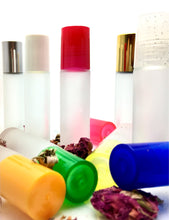 Load image into Gallery viewer, Frosted Roller Bottles with Colored Caps. A great wholesale roller. This Perfume Roll On is great for Witchcraft.