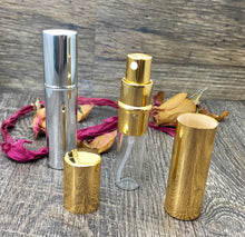 Cargar imagen en el visor de la galería, Metallic Perfume Bottles. 12 ml Atomizer Spray Bottles. Metallic Gold or Metallic Silver options. Inner chamber holds the Perfume Oils, Essential Oils or Fragrance oils for Perfumes, Colognes, Room Sprays, Car Refreshers and Pillow Mists.