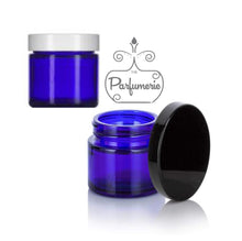 Load image into Gallery viewer, 1 oz. Cobalt blue straight sided cosmetic jar with lined lid options. High quality UV proof glass. Safe for all essential oil products.
