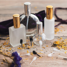Cargar imagen en el visor de la galería, Assorted Perfume Bottles. Our focus is the 2 oz. Perfume Spray bottle. Frosted Glass with Gold Atomizer Sprayer Top and Over Cap for Perfume Oils, Essential Oils or Fragrance Oils.