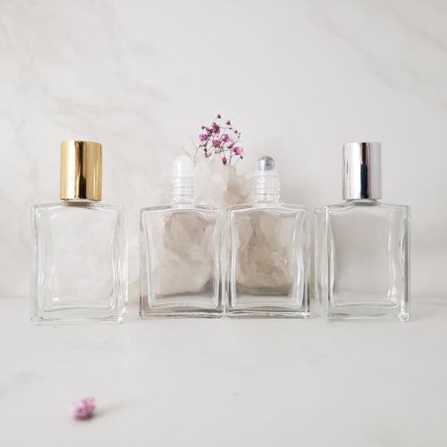A perfume travel bottle in a rectangle shape with plastic or steel inserts and gold or silver cap options.