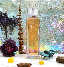 Load image into Gallery viewer, 1001 Nights Perfume Oil. The Parfumerie offers a 30 ml Gift Bottle in a clear glass bottle with a fancy ribbed top. The perfect Unisex Gift!