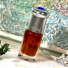Load image into Gallery viewer, Deer Musk Kasturi Kijang in a 3 ml Gift Bottle with a blue crystal on top and plastic meel.