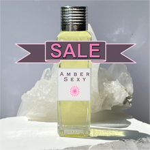 Load image into Gallery viewer, Amber Sexy Perfume Oil. This is no Riddle, 30 ml gift bottle is on SALE!