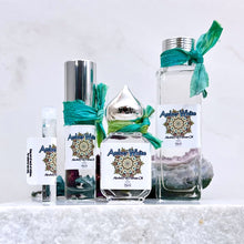 Load image into Gallery viewer, Amber White / White Amber at The Parfumerie Store. Bottle options in 1 ml, 10 ml Roll On and Gift Bottle and 30 ml Gift Bottle.