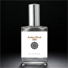 Load image into Gallery viewer, Amber Musk 500 Perfume Bottle with a silver sprayer cap. An atomizer spray perfume. 