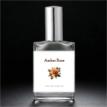 Load image into Gallery viewer, Amber Rose 2 oz Perfume Bottle with a silver sprayer cap. An atomizer spray perfume. 