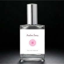 Load image into Gallery viewer, Amber Sexy Perfume Bottle with a silver sprayer cap. An atomizer spray perfume. 