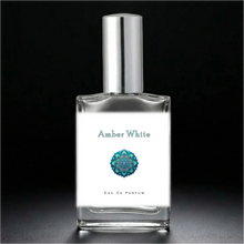 Load image into Gallery viewer, Amber White Perfume Bottle with a silver sprayer cap. An atomizer spray perfume. 