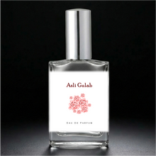Load image into Gallery viewer, Asli Gulab Eau de Parfum clear glass perfume bottle with a shiny silver cap.