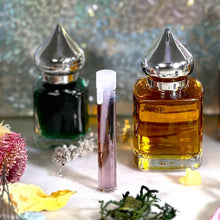 Load image into Gallery viewer, Dehn Al Oudh - Swiss Arabian offered by The Parfumerie comes in a 1 ml sample vial, 8 ml and 15 ml Gift Bottle with pointed shiny cap.