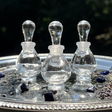 Load image into Gallery viewer, Clear Glass Potion Genie Bottles on a silver tray sparkling in the sunshing. Imagine colorful perfume oils inside. GORGEOUS!