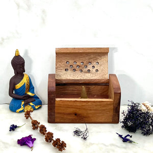 Our Incense Cone Burner with a Mini Buddha next to it. Grab 1 of each for a great Unisex Gift!