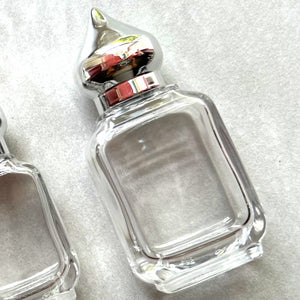 15 ml Gift Bottle with Silver Minaret Cap. The perfect Unisex Gift filled with our Alcohol-Free and Vegan Perfume Oils.
