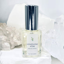 Load image into Gallery viewer, This All-Natural Honeysuckle Flower Perfume is placed in a large size Clear Glass Perfume Bottle.