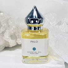 Load image into Gallery viewer, 15 ml Palo Essential Oil Perfume comes in a clear Glass Bottle with Pure Oil. No synthetics, No Parabens and No Phthalates!