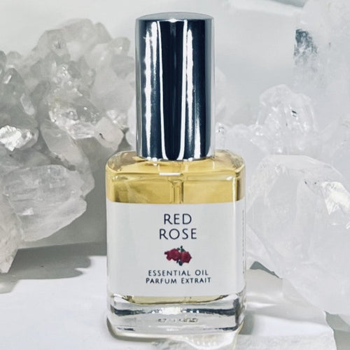 Red Rose Essential Oil Perfume 15 ml Parfum Extrait. A luxury perfume bottle with a shiny silver sprayer.