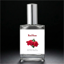 Cargar imagen en el visor de la galería, Red Rose Essential Oil Perfume Eau de Clear perfume bottle with silver sprayer.