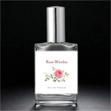 Load image into Gallery viewer, Rose Wardia in a clear glass perfume bottle with a shiny silver sprayer cap. Phthalate Free and Paraben Free. 1 oz and 2 oz.