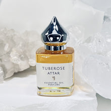 Load image into Gallery viewer, 15 ml Tuberose attar in a clear Gift Bottle with Silver pointed minaret cap and Nunn Design Charm.