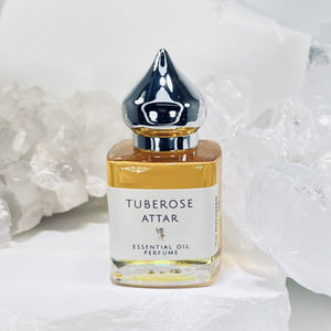 15 ml Tuberose attar in a clear Gift Bottle with Silver pointed minaret cap and Nunn Design Charm.