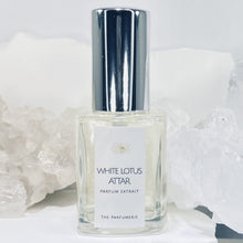 Load image into Gallery viewer, 30 ml White Lotus Attar Parfum Extrait Concentrate in a clear perfume bottle with Certified Organic Cane Alcohol