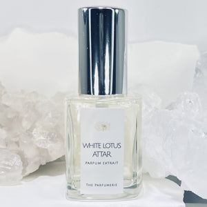 30 ml White Lotus Attar Parfum Extrait Concentrate in a clear perfume bottle with Certified Organic Cane Alcohol