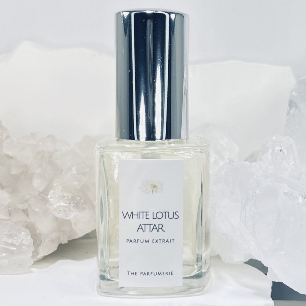 30 ml White Lotus Attar Parfum Extrait Concentrate in a clear perfume bottle with Certified Organic Cane Alcohol