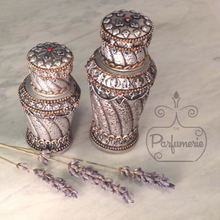 Load image into Gallery viewer, Resin Perfume Bottles with glass interior in sizes 6ml and 12ml. Silver color we also carry Bronze. These Bottles can hold Perfume Oils, Attars and Ouds.