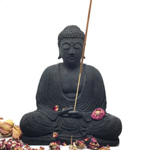 Load image into Gallery viewer, Buddha Incense Holder made of black volcanic stone holding an Incense Stick for 45 minutes to an hour and a half of burn time!