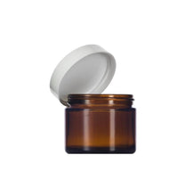 Load image into Gallery viewer, 1 oz. amber glass straight side jar with lid options. wholesale cosmetic supplies lotions