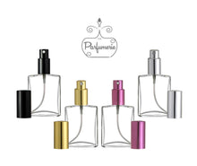 Load image into Gallery viewer, Large Perfume Bottles. Clear glass Flat Spray Bottles in sizes 1/2 oz. 1 oz., 2 oz. and 4 oz. Cap color options are Black, Gold, Purple and Silver.