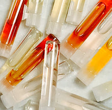 Load image into Gallery viewer, Vials with essential oils and perfume oils and attars and cologne. The perfect size!