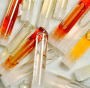 Vials with essential oils and perfume oils and attars and cologne. The perfect size!