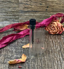 Load image into Gallery viewer, 1ml Sample Perfume vial picture. Clear glass vial with a black plug.