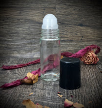 Load image into Gallery viewer, 30ml Clear Glass Perfume Bottle. This Roller Bottle comes with a plastic Rollerball and black cap