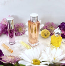 Load image into Gallery viewer, Champa Flower Floral Perfume at The Parfumerie Store. Check out our different size perfume bottle options!