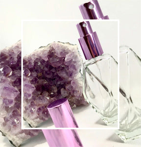 Diamond Glass Atomizer Perfume Bottle with a Purple spray top and over cap. Sizes available are 1/2 oz., 1 oz. and 2 oz.