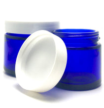 Load image into Gallery viewer, 1 oz. Cobalt blue straight sided cosmetic jar with lined lid options. High quality UV proof glass. Safe for all essential oil products.