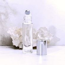 Load image into Gallery viewer, 10 ml Clear Glass Roller Bottle with a Stainless Steel Rollerball Insert and Silver Shiny Cap. Travel Size Perfume Bottle.