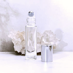 10 ml Clear Glass Roller Bottle with a Stainless Steel Rollerball Insert and Silver Shiny Cap. Travel Size Perfume Bottle.