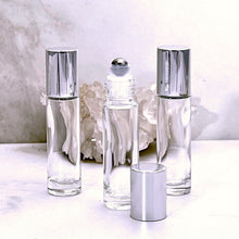 Load image into Gallery viewer, 3 pack of 10 ml Clear Glass Roller Perfume Bottles with Steel Rollerball Inserts and Silver Shiny Caps. Makes a great gift!